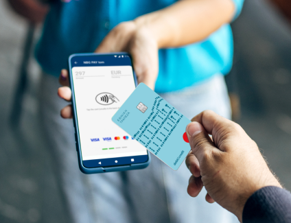 A chip card is tapped against a terminal on a mobile device