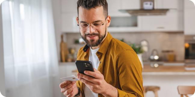 A customer looks at his mobile device to consider paying with a payment link